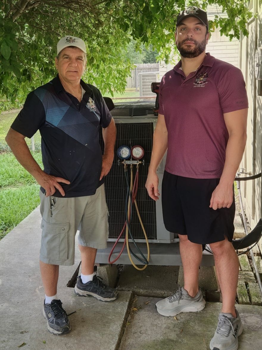 Owner Michael Lopez and Lead Technician Juan Lopez of Who-Dat Electrical & Mechanical at a job site